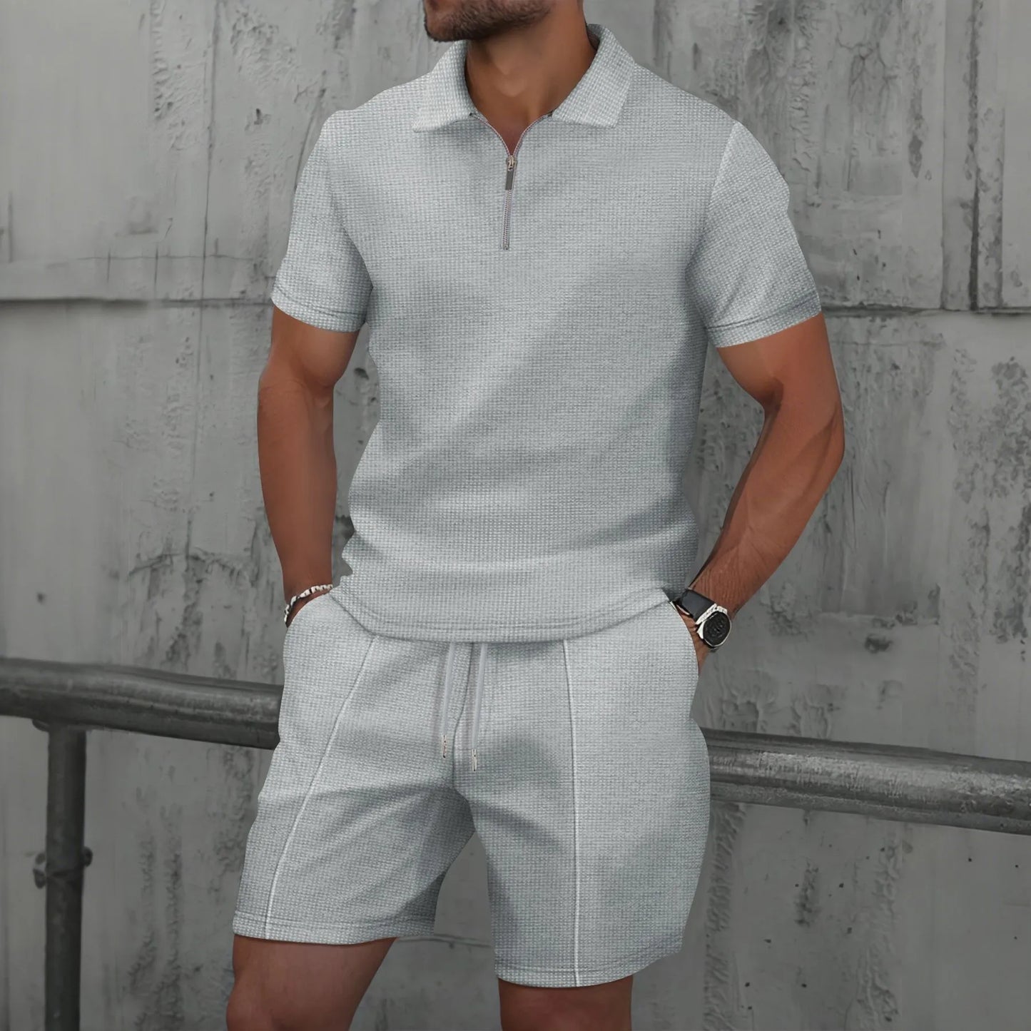 Ensemble polo homme gaufré gris clair : polo à zip manches courtes et short assorti.