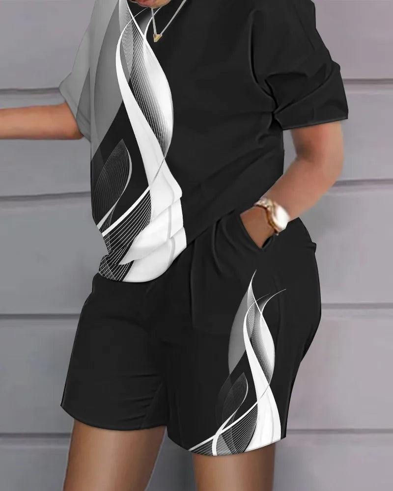 Ensemble deux pièces : t-shirt noir à empiècement blanc et short noir avec motifs blancs