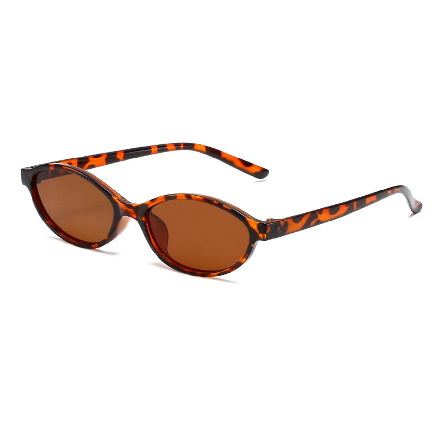 Lunettes de soleil à monture écaille orangée, verres bruns, forme ovale œil-de-chat