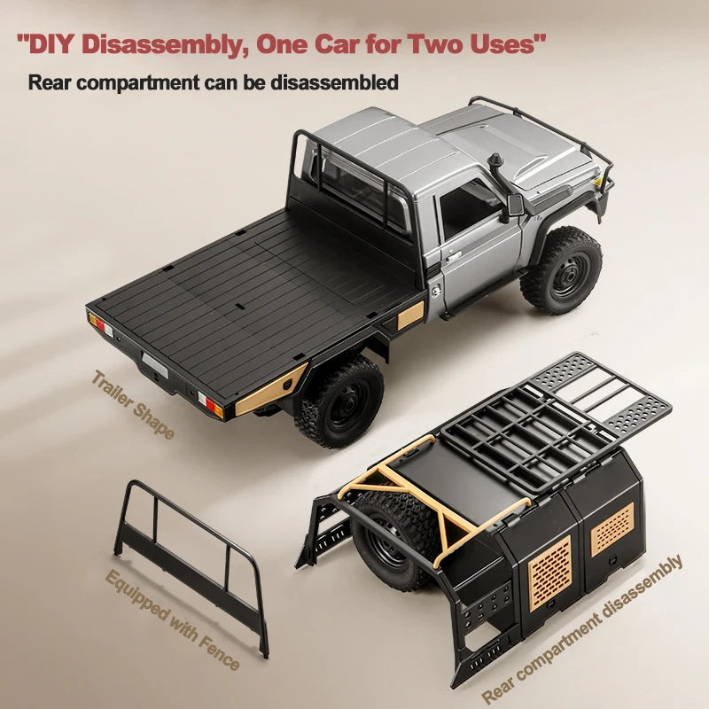 Camionnette RC crawler 1/12 4x4 grise, benne avec plateau quadrillé et pneus tout-terrain.