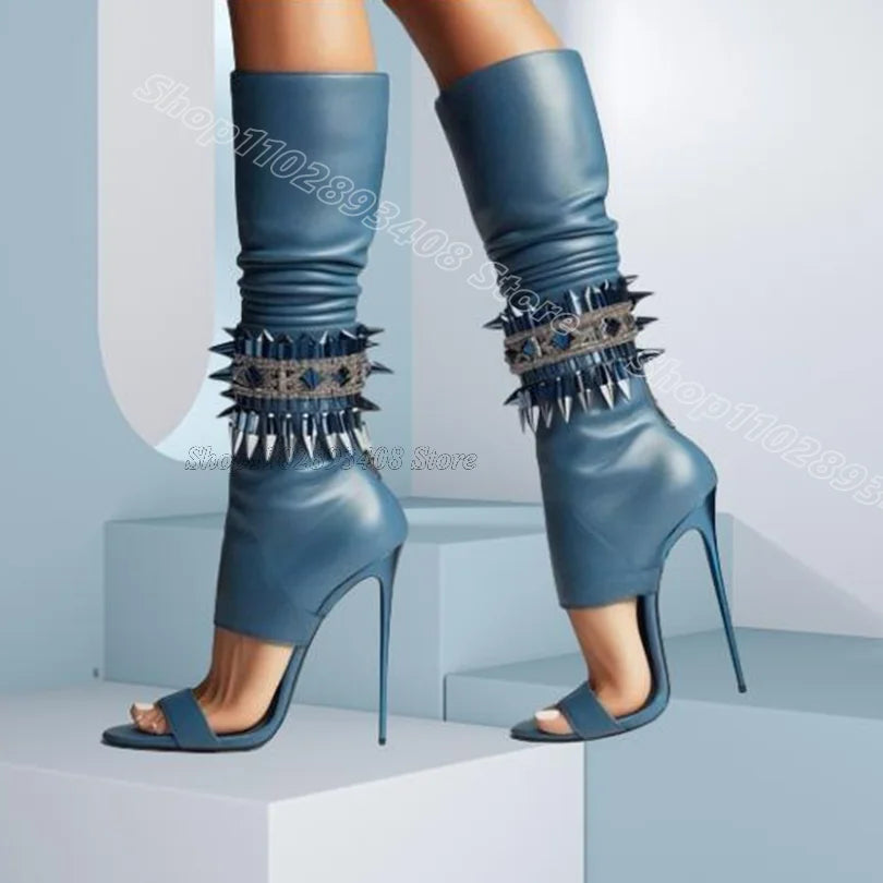 bottes a talon éguilles en cuir  détails clouté luxe