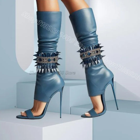 bottes a talon éguilles en cuir  détails clouté luxe