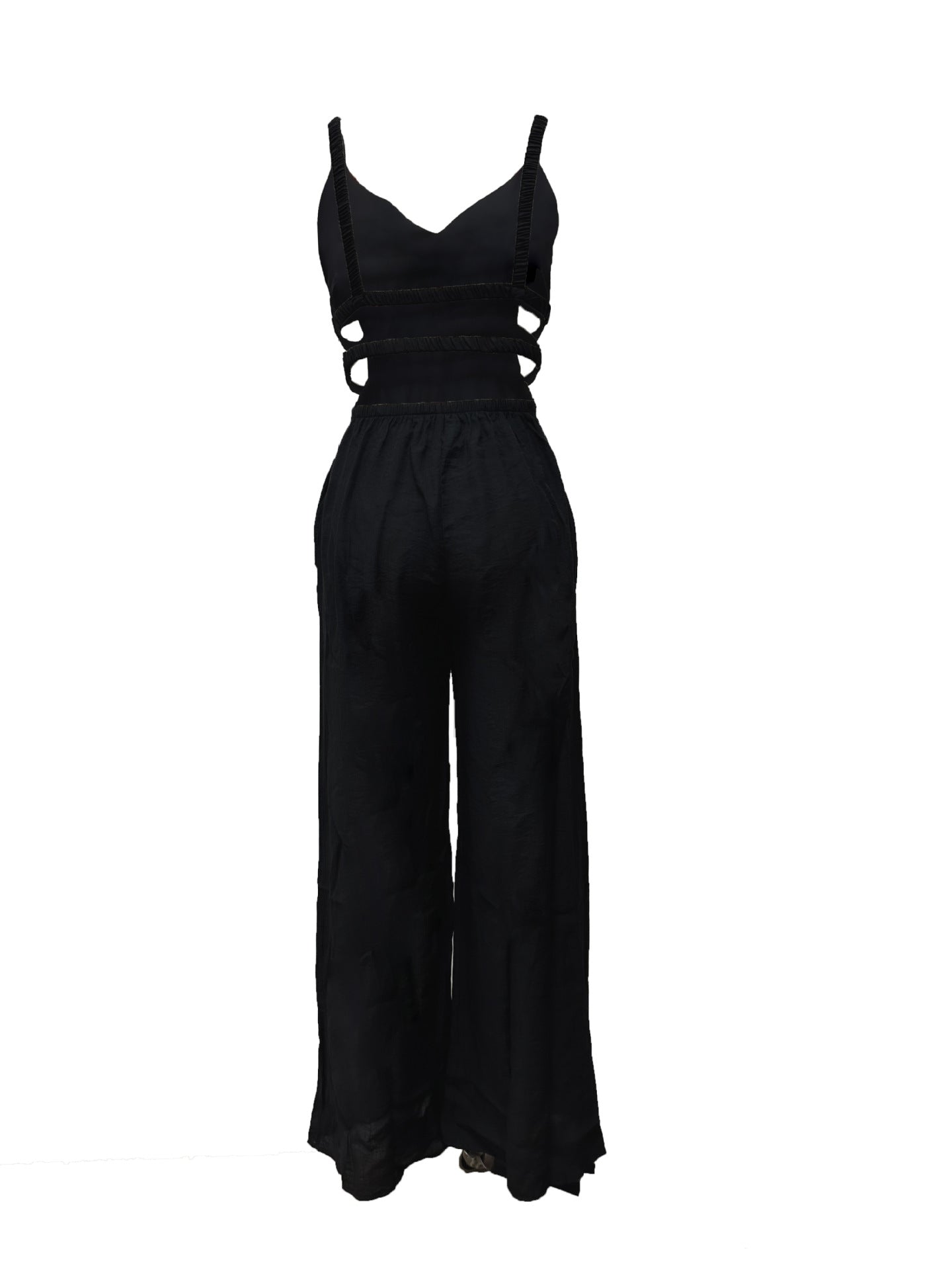 Combinaison noire dos nu sans manches, bretelles avec encoches, pantalon ample jambes larges