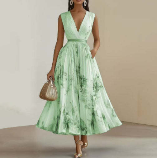 Robe sans manches à taille haute imprimée vert menthe, décolleté en V.