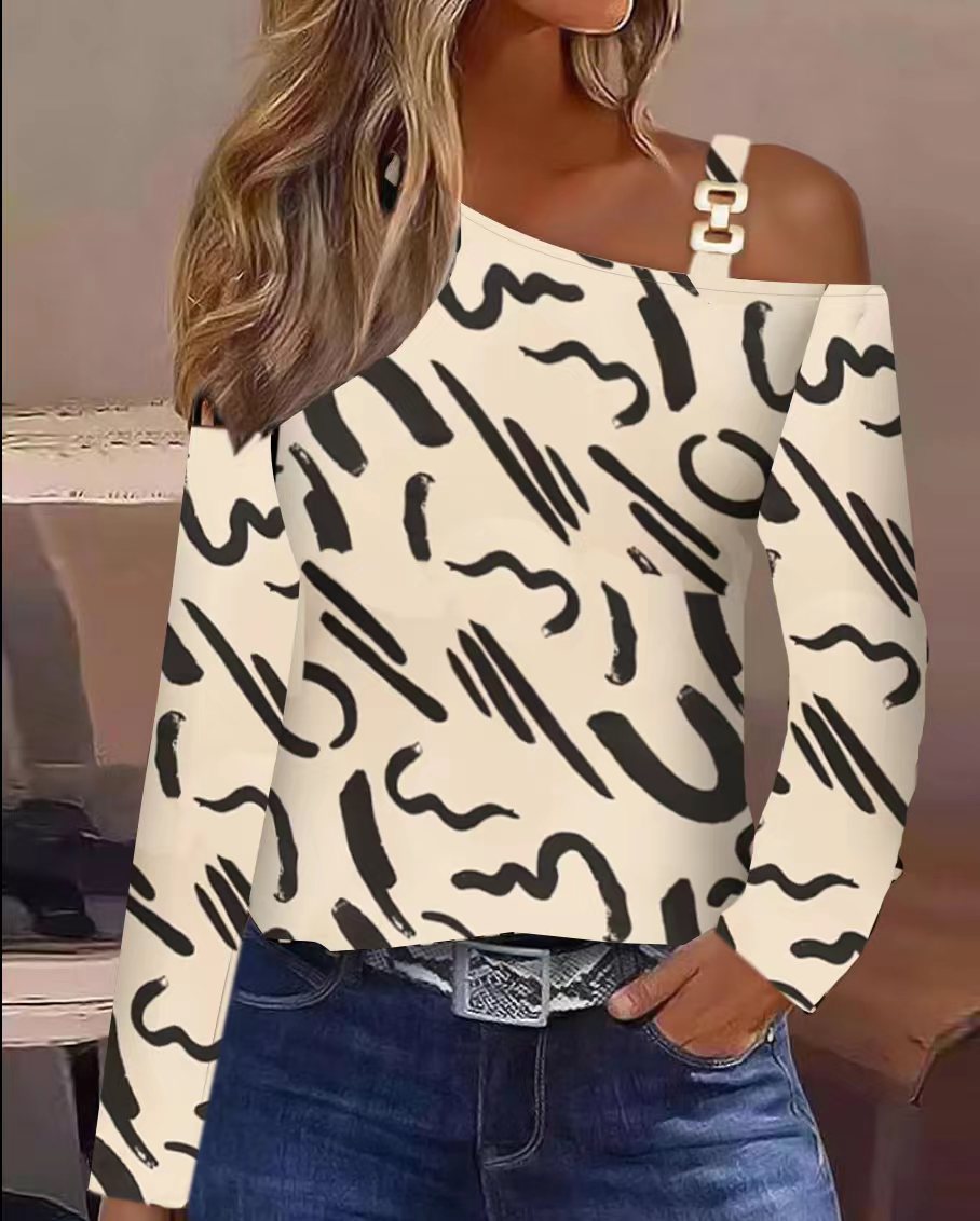 Top femme épaules dénudées crème à motif abstrait noir, manches longues, chaîne décorative